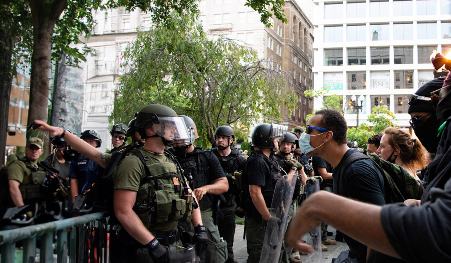 College students standing off with police at a riot. Ben Merkle addresses Israel, Hamas, and the failure with America's universities as a result of the conflict from October 7, 2023